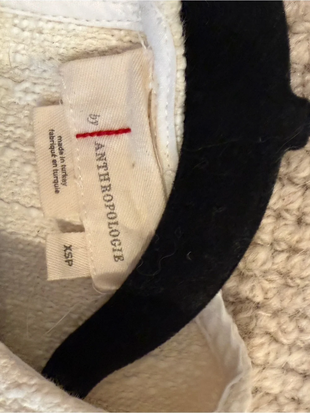 Anthropologie Cream Textured Shell with White Puff Sleeves